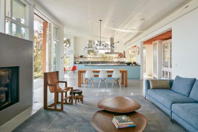open plan living room with large sliding glass doors on either side