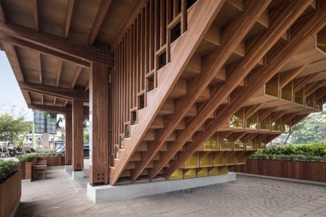 a wooden staircase leading into a wooden building