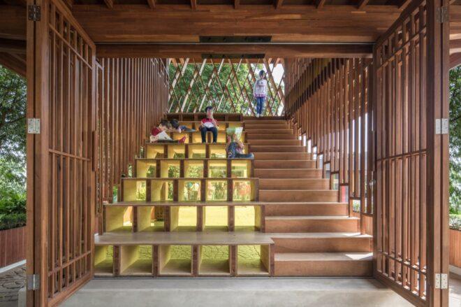 to the left, a staircase-like structure with translucent yellow blocks. to the right, a wooden staircase