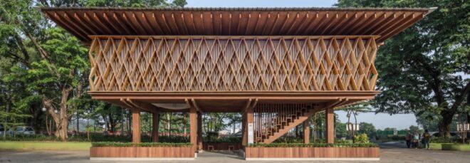 closeup of a rectangular wood building on stilts