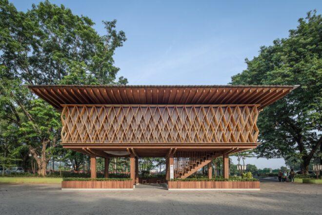 streetview of a rectangular wood building on stilts