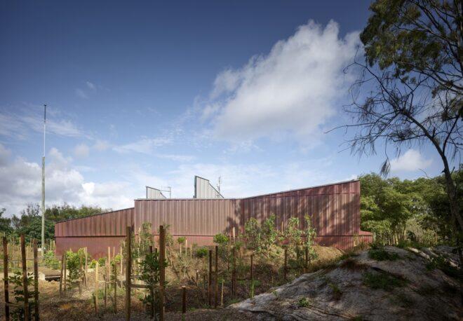 copper building surrounded by trees