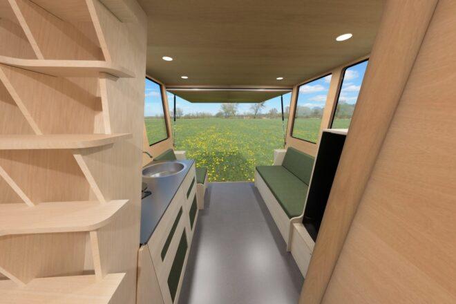 living space inside camper with fold-out back door