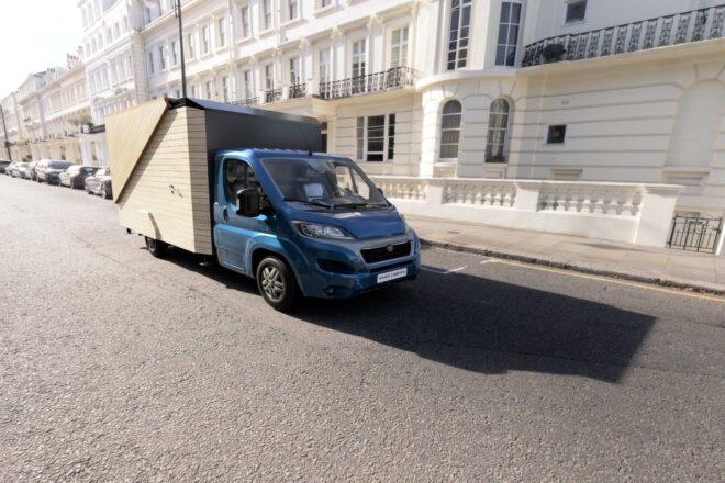 blue truck with wooden box