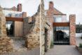 home with broken brick facade and modern interior