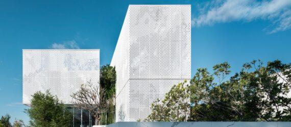 large white tower with perforated exterior