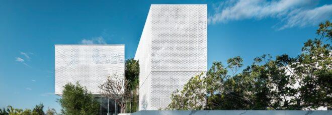 large white tower with perforated exterior