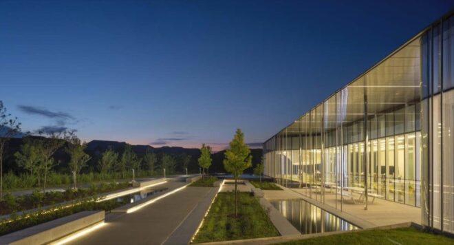 long road parallel to glass library building