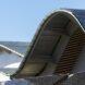 close-up of wavy roof covered in solar panels
