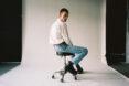 person wearing white shirt and blue jeans