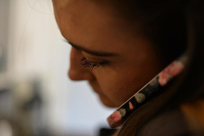 close-up of person talking on cellphone