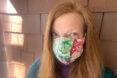 person wearing patterned face mask