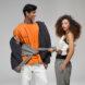 two people wearing gray, black, white and orange T-shirts and tracksuits