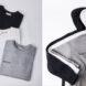 flat lay of folded gray, white and black T-shirts and sweatshirts