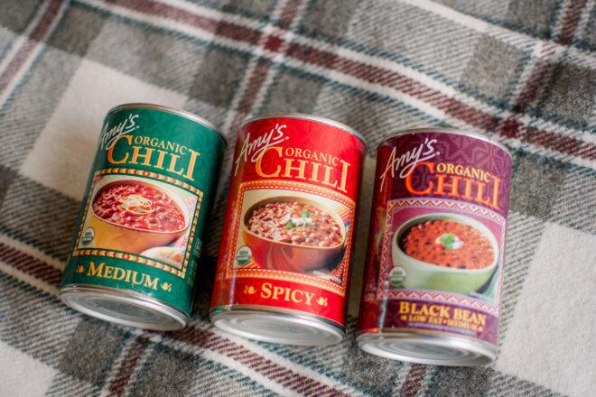 three cans of Amy's brand vegan chili
