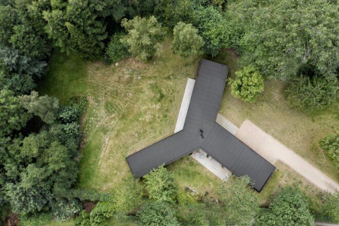 aerial view of windmill-shaped home