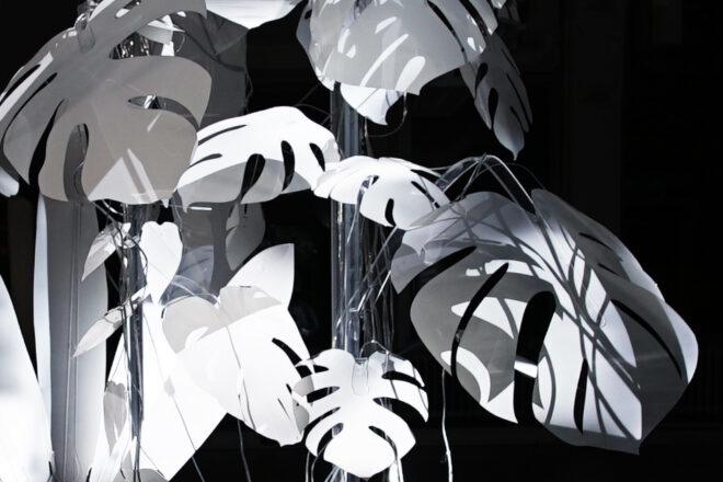 a closeup of lit-up leaf forms on the art piece