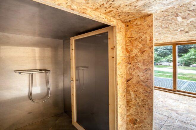 shower space inside plywood room