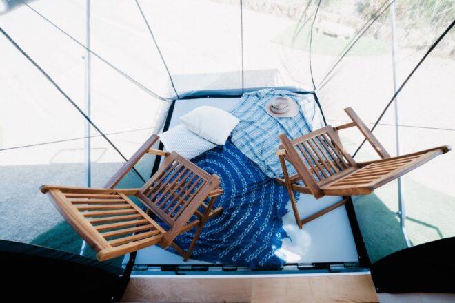 aerial view of small deck with two wooden chairs