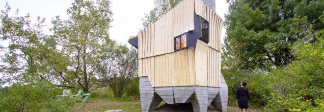 tiny angular cabin on concrete stilts
