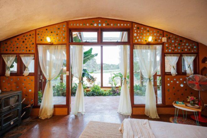 arched glass doorway leading out to covered patio