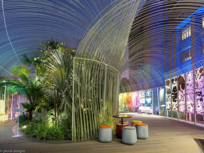 plants growing inside a clear pavilion