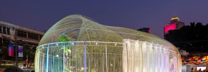long, clear pavilion with multicolored lights
