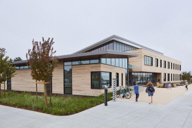wood-clad library building with slanted roof