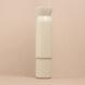 white reusable water bottle stacked on top of a small white coffee cup