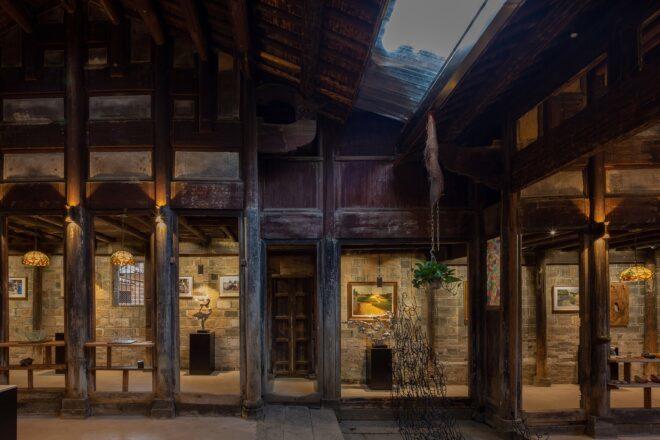 rendering of art on old stone walls in an ancient building