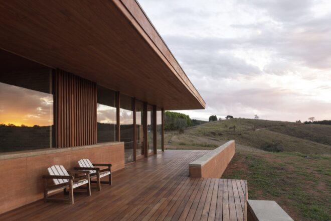two wood chairs on a wood deck