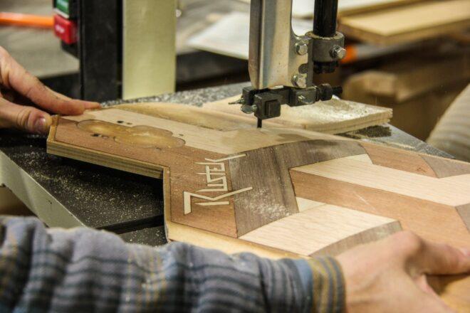 shot of wooden skateboard being made