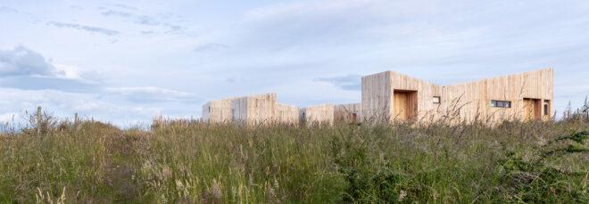 wood cabins with slanted roofs