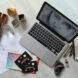 art supplies in front of a laptop
