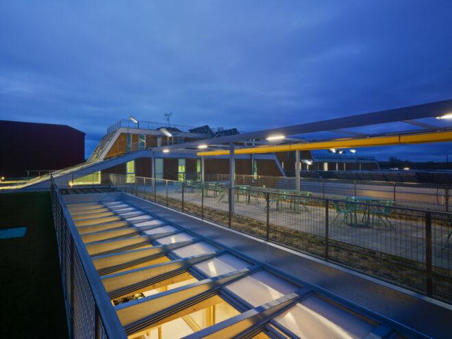 dining tables and chairs on an enclosed roof