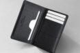 small vegan leather wallet on white background