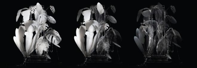 from left to right, three forms of the art piece: fully lit, partially lit, and fully un-lit