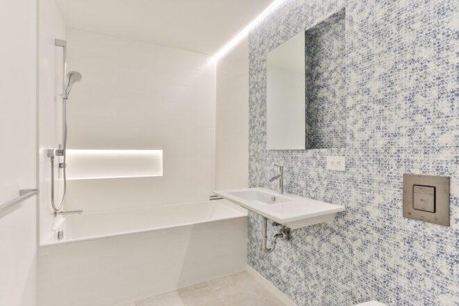 white bathroom with gray tiles