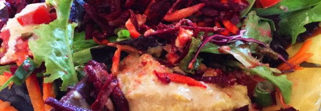 a closeup of a quinoa salad with beets