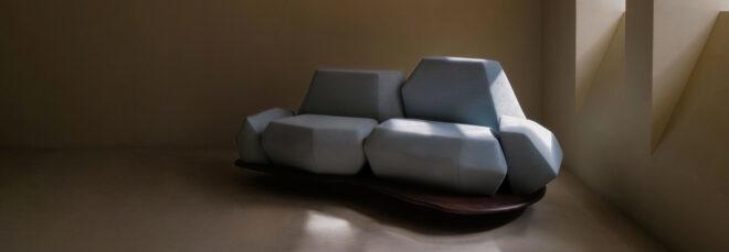 geometric light blue sofa in a beige room