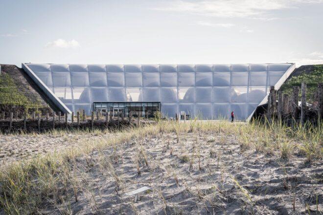 sand outside white ETFE structure