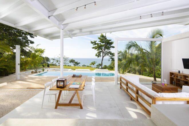 an open living area with views of the outdoors