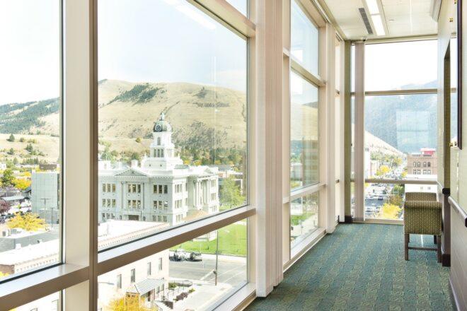 view of historic downtown from an office with glass walls