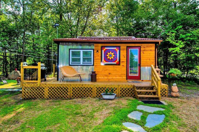 tiny home with wood and corrugated metal exterior