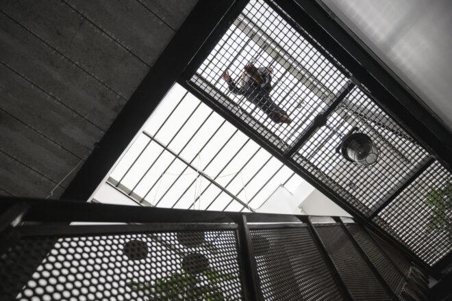 stairs and elevated walkway made of metal mesh