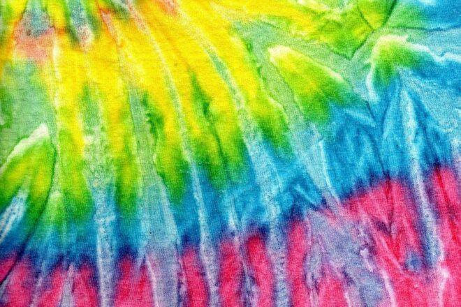 yellow, blue and red tie-dye cloth