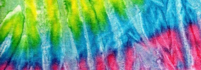 yellow, blue and red tie-dye cloth