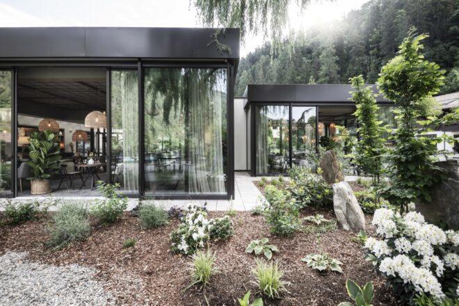 black metal building with glass walls
