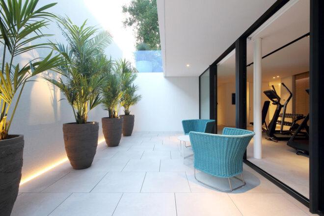 blue chairs on a covered patio