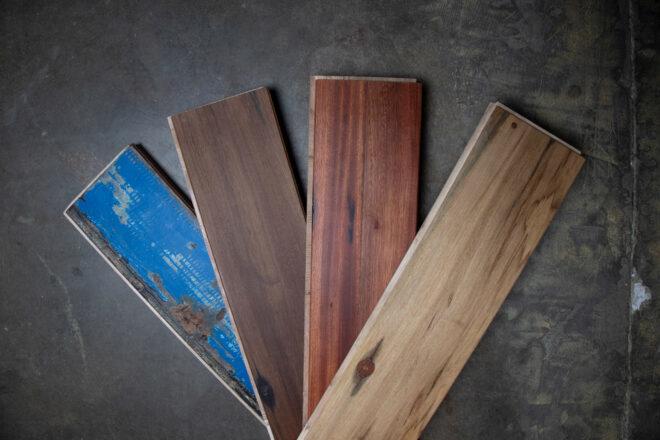 blue, dark wood, cherry wood and blond wood flooring planks